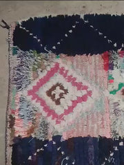 Load and play video in Gallery viewer, Rustic Chic: Handcrafted Berber Vintage Bouchouite Rug - A True Vintage Gem | 70cm x 200cm In Stock
