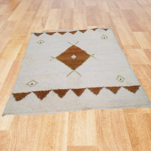 Moroccan white and brown area rug, minimalist engraved Berber rug